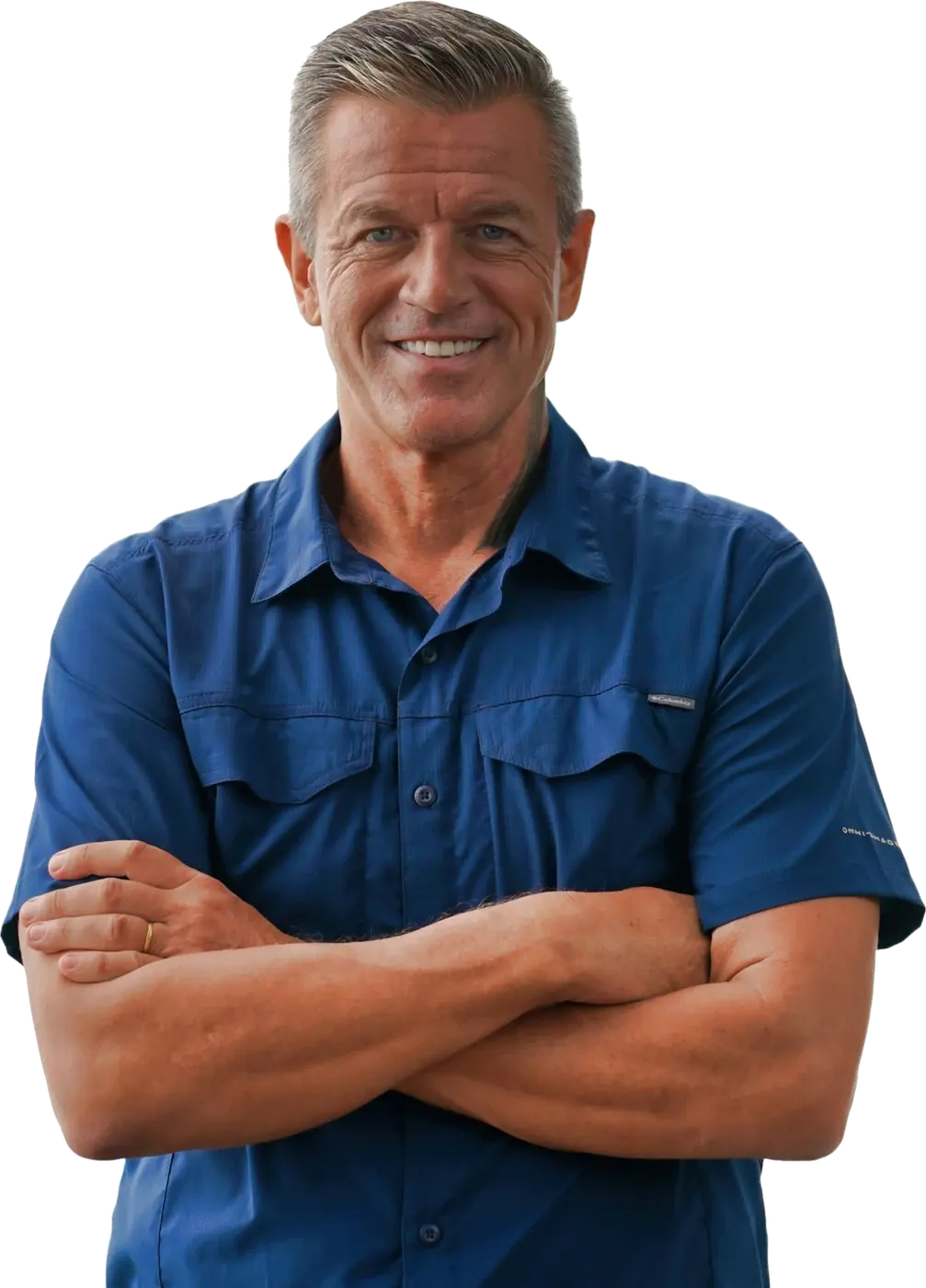 A smiling HVAC pro in a navy work shirt, arms crossed