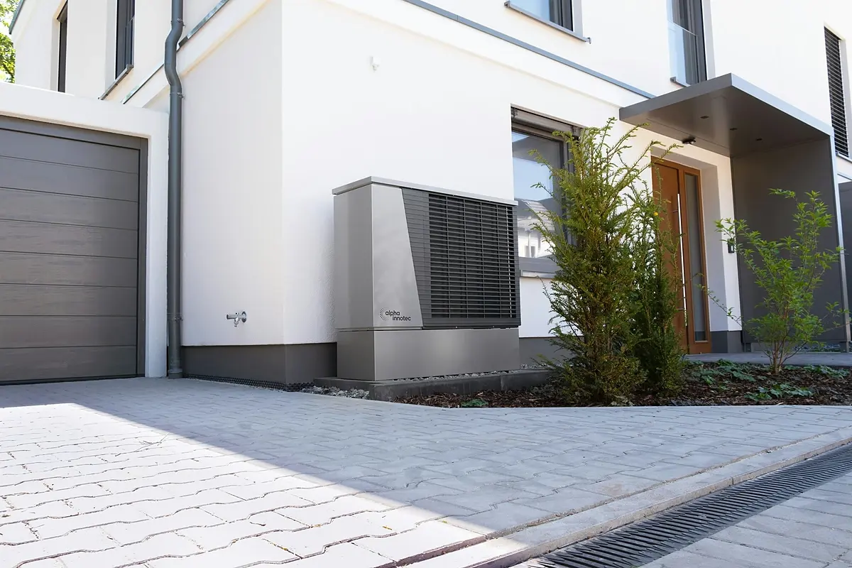 Outdoor AC unit beside a Wheatland home built in the 2000s